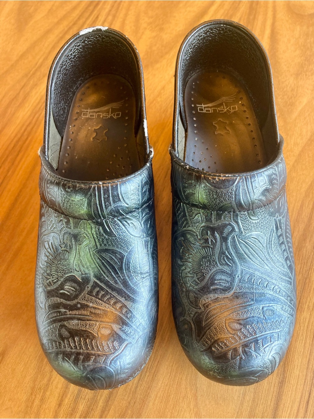 Dansko Embossed Leather Clogs in Teal-Green with Dark Accents